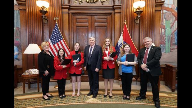 Pictured, left to right, Senator Karla Eslinger, Marjorie Sheehan and Isabella Davis both of Willow Springs High School, Governor Mike Parson, Madilyn Harris and Sydney Roberts both of West Plains High School, and Representative David Evans. photo provided