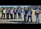 Members of IAM Local 2782 on May 1 outside Leonardo DRS property. The workers in the photo requested that their names not appear with the photo but consented to pose for the picture. Howell County News/ Amanda Mendez