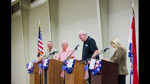 Howell County office holders share a smile as they participate in a moderated panel on proposed Amendments on the Aug 4. ballot. From left: Howell County Sheriff Matt Roberts, Assessor Daniel Franks, Presiding Commissioner Ralph Riggs, and Collector of Revenue Janet Crow. Sees the Moment Photography for Howell County News