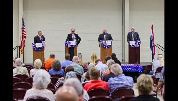 Four candidates for Howell County Associate Circuit Judge debate in West Plains Wednesday night, from left to right: Lyndell Beard, Larry Burton II, Heath Hardman, and Marty Simpson. Sees the Moment Photography for Howell County News