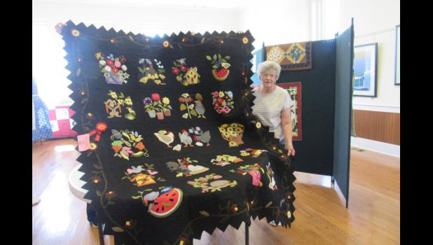 Beverly Patterson with her award-winning quilt. This piece took second prize in the “modern” category. Howell County News/ Amanda Mendez
