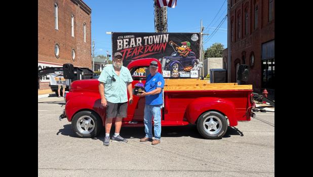 Bob Berry (right) is pictured with his 1946 Studebaker pickup, the 2026 Peoples Choice winner. Also pictured is Travis Brake. photo provided