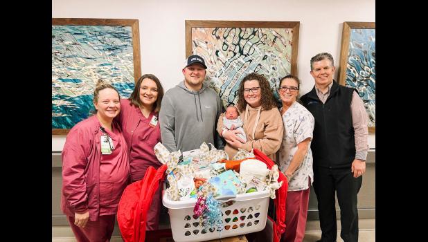 Ozarks Healthcare has welcomed its first baby to be born at its Women’s Center in 2023. Brooks Davis entered the world at 3:28 p.m. on January 1. Pictured left to right are Hailey Bunch, Savannah McClune, nurses at Ozarks Healthcare’s Women’s Center, Chance and Autumn Davis, parents, LaDonna Sullivan, nurse at Ozarks Healthcare’s Women’s Center, and Dr. Jeffrey Roylance, Burton Creek Rural Clinic. photo provided