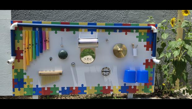 The sensory board bristling with musical objects, sponsored by Children’s Behavioral Services. Howell County News/ Amanda Mendez