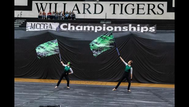Spintronix-A members Shay Moss and Cade Atchley with their flags during their state championship performance. photo provided