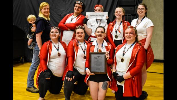 Spintronix World Color Guard is pictured above with their gold medals. Back row, left to right, Victor Brown of Mountain View, Director Jackie Brown of Mountain View, Adam Hajeh of Willow Springs, Samantha Huffman of West Plains, Sydney Forck of Ashland, and Cheyenne Robison of West Plains. Front row, left to right, Stephanie Watson and Shandon Gross of West Plains, Sam Wallace of Columbia, and Megan Uminn of West Plains. Not pictured is Camryn Bishop of Ava. photo provided