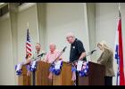 Howell County office holders share a smile as they participate in a moderated panel on proposed Amendments on the Aug 4. ballot. From left: Howell County Sheriff Matt Roberts, Assessor Daniel Franks, Presiding Commissioner Ralph Riggs, and Collector of Revenue Janet Crow. Sees the Moment Photography for Howell County News