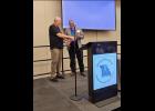 The former Howell County Surveyor, Ralph Riggs, is pictured presenting his brother, current Howell County Surveyor Ray Riggs with the Robert E. Myers Memorial Service Award. photo provided